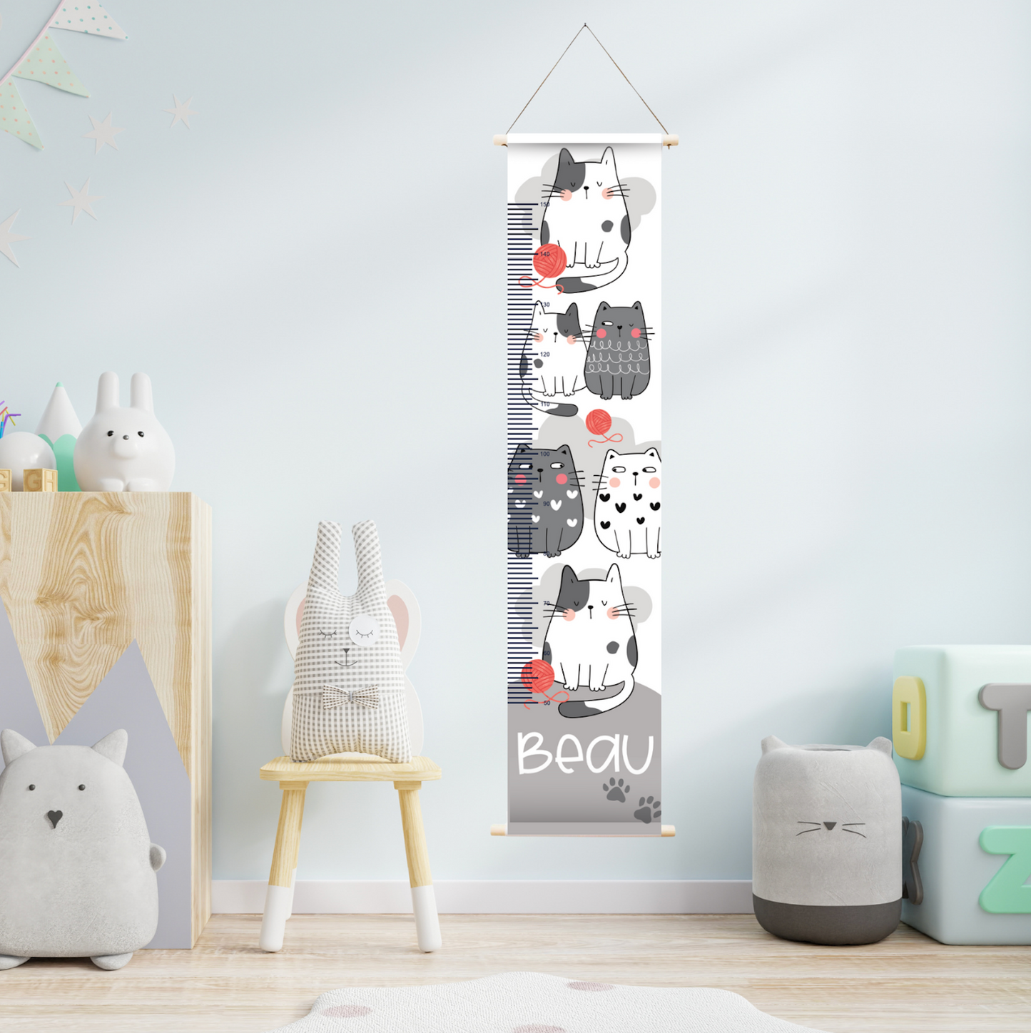 Groeimeter met naam en de afbeelding van diverse katten.