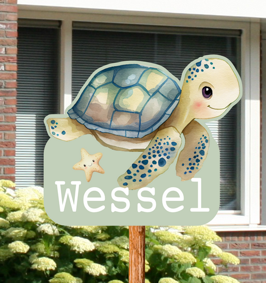 Geboortebord voor in de tuin van een schildpad, met zeester.