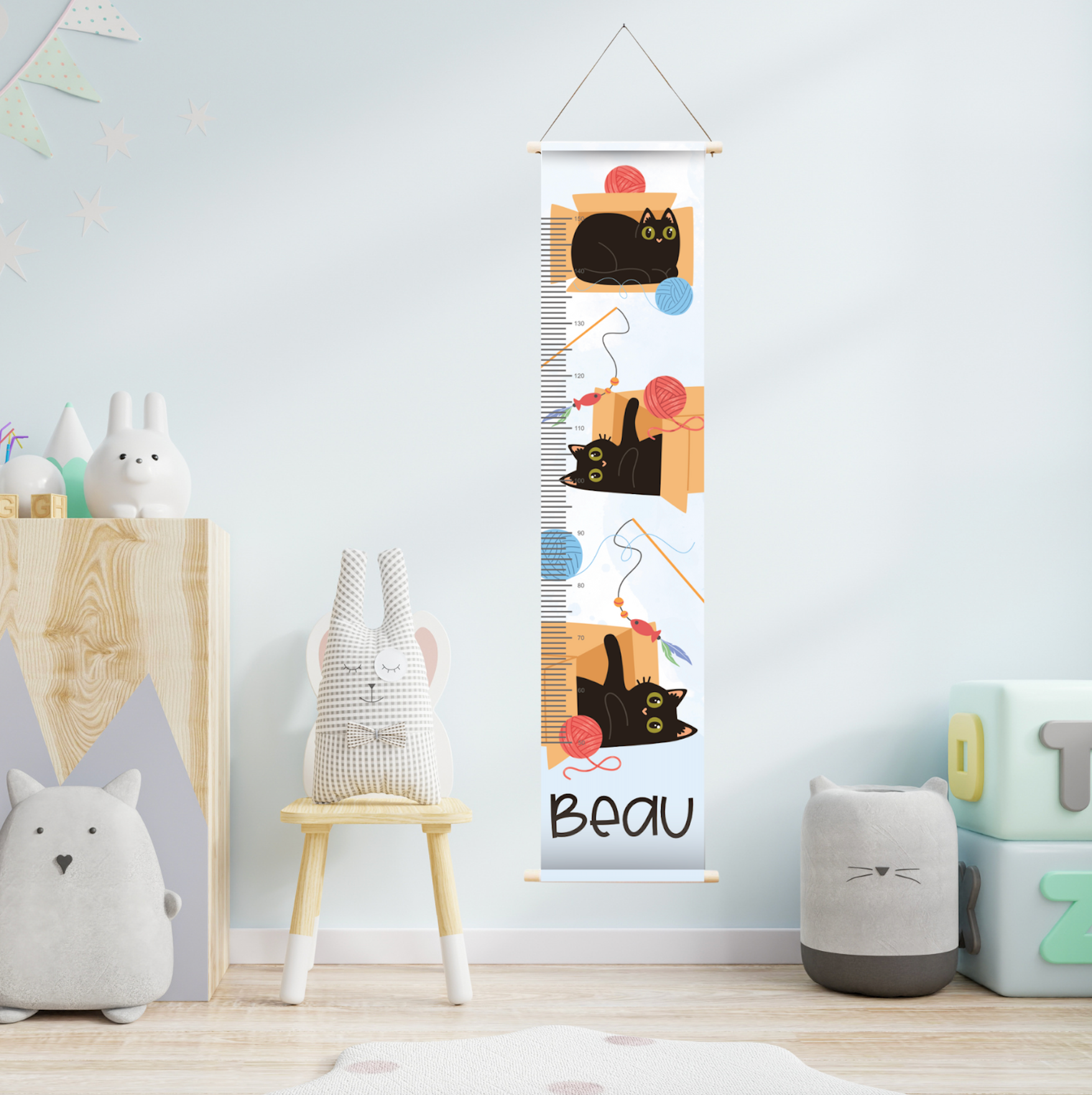 Groeimeter met naam en de afbeelding van diverse katten